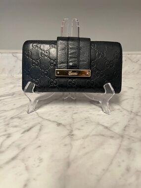 Gucci Black Embossed GG Leather Wallet with Gold Nameplate